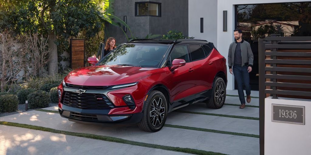 A red 2023 Chevrolet Blazer parked outside.